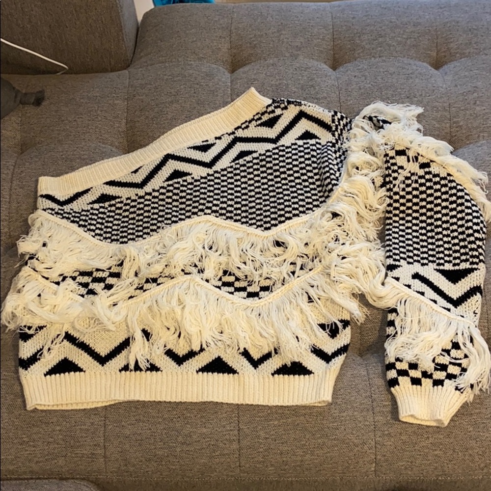 Cream & black fringe off the shoulder sweater.